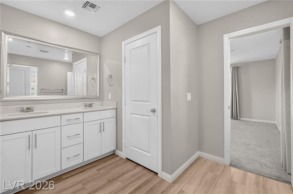 Primary bathroom vanity with Piedrafina counters