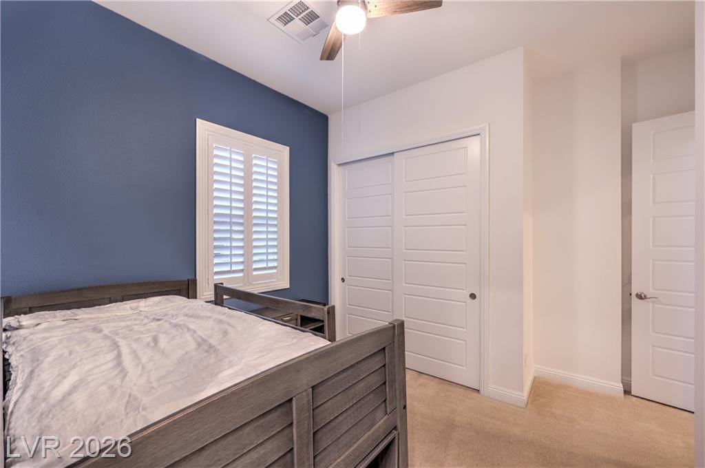 Third bedroom with ceiling fan