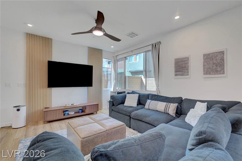 Living room and dining space in the largest floor plan in the community