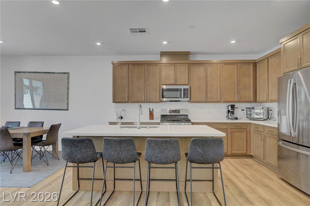 Kitchen island with breakfast bar seating