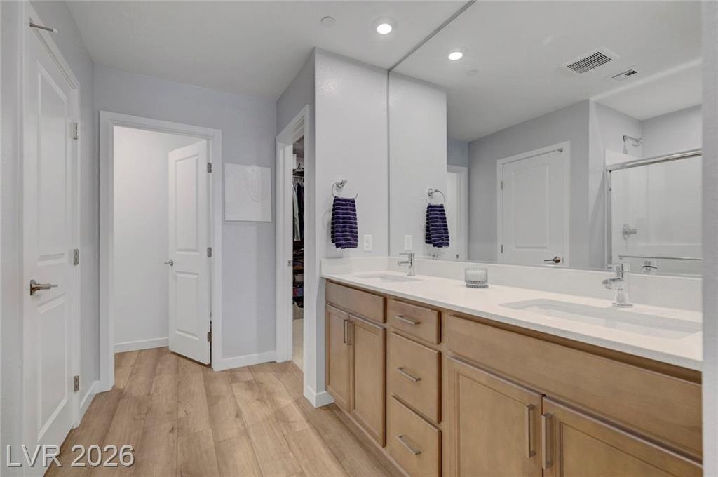 Primary bathroom with dual vanity