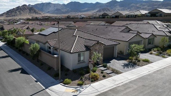 Aerial view of KB Home Greencourts homes and mountain backdrop in Inspirada, Henderson NV