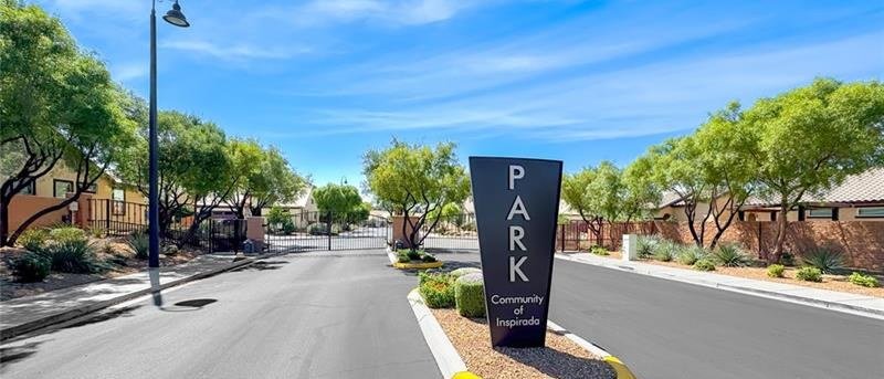 The gated entrance to Park, the Beazer Homes collection at Inspirada in Henderson NV, with the Park community monument sign