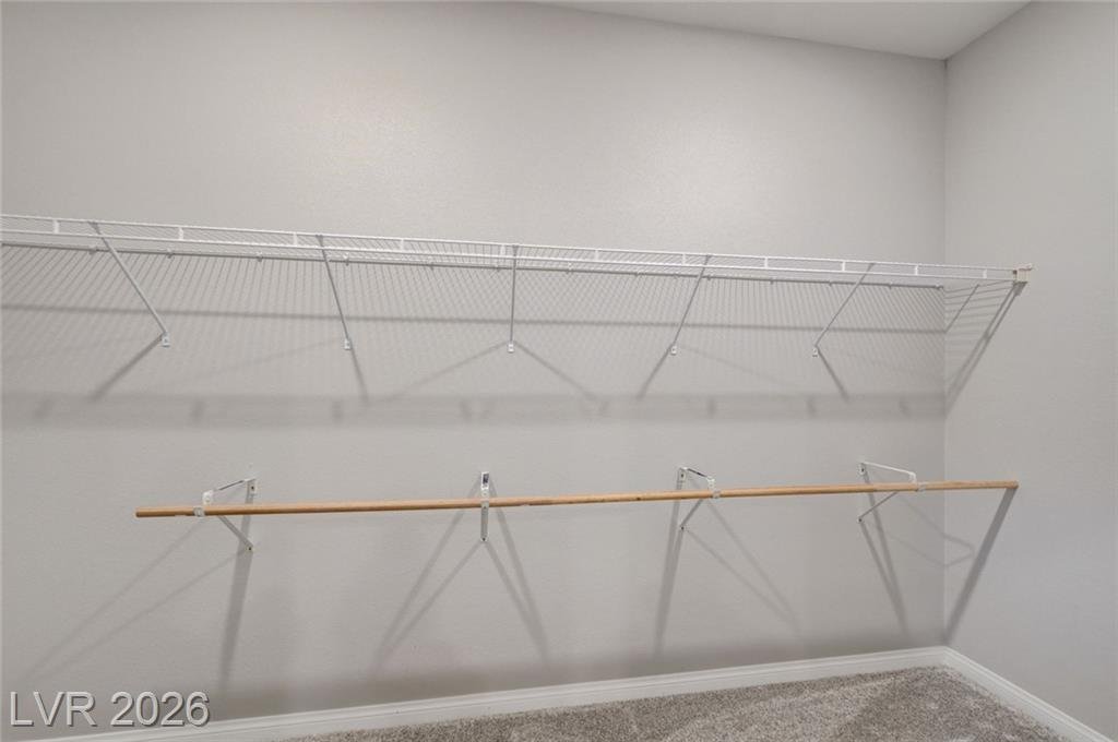 Walk-in closet with double-hung wire shelving