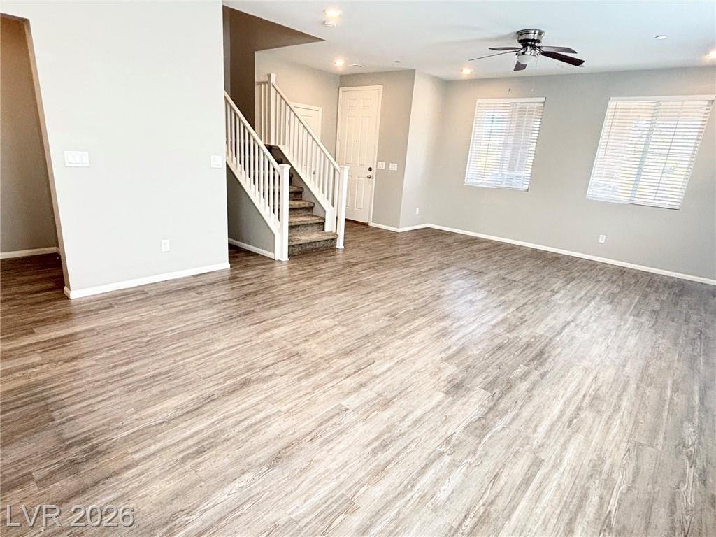 Living room at 2850 Alenga Street looking toward the staircase and front windows