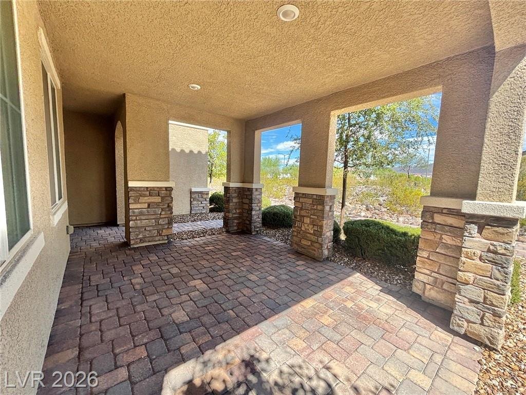 Covered patio with brick paver flooring at 2850 Alenga Street