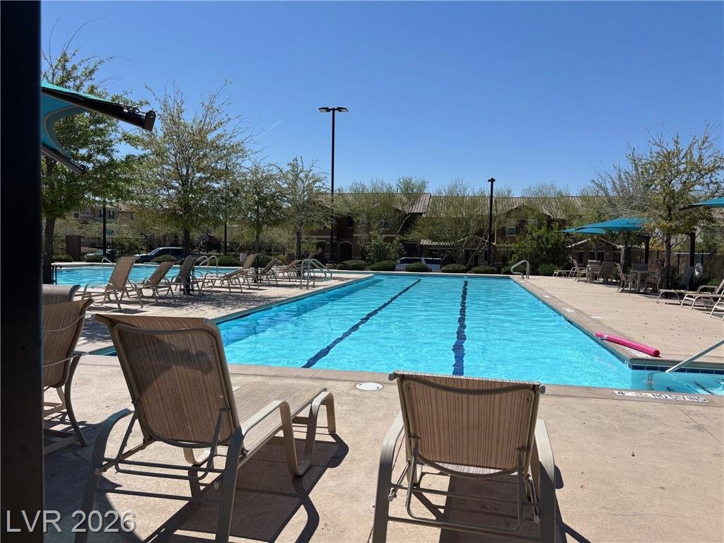 Inspirada community pool with lounge seating