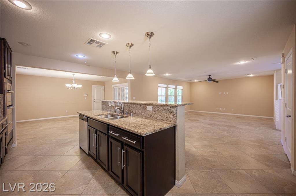 Kitchen island and dining area at 3198 Sisley Garden Avenue