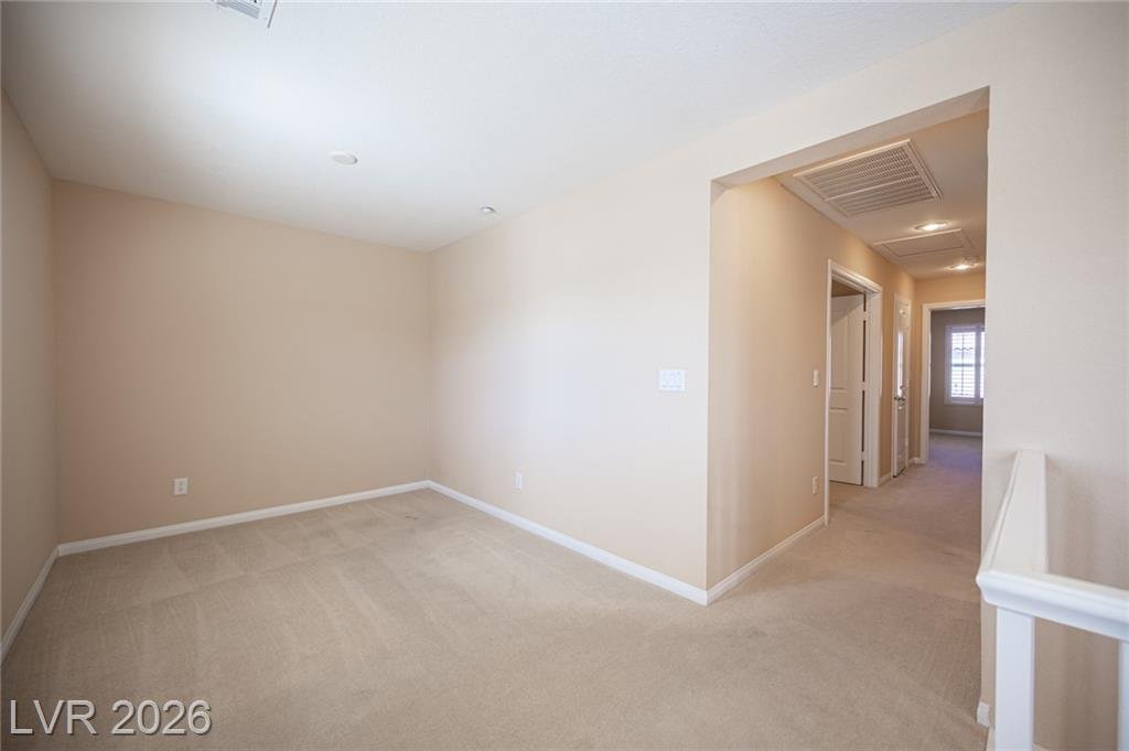 Open loft area on the second floor of 3198 Sisley Garden Avenue