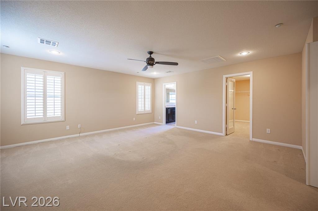 Primary bedroom at 3198 Sisley Garden Avenue toward the bath entry