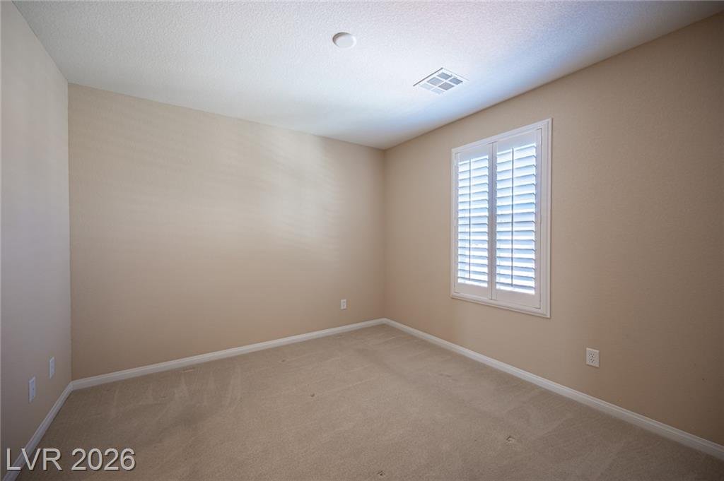 Third bedroom with plantation shutters