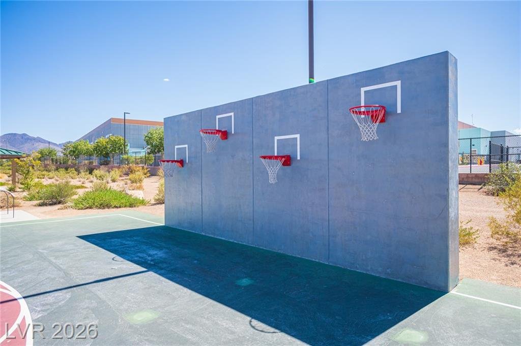 Four-hoop basketball wall at a community court