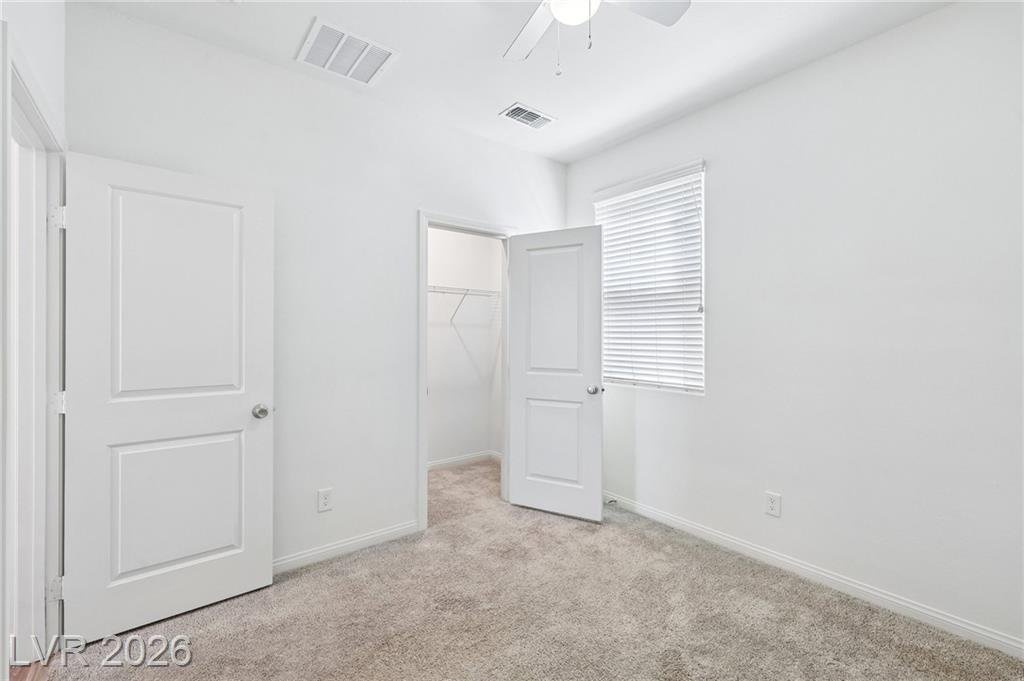 Downstairs bedroom doorways to the closet and hall