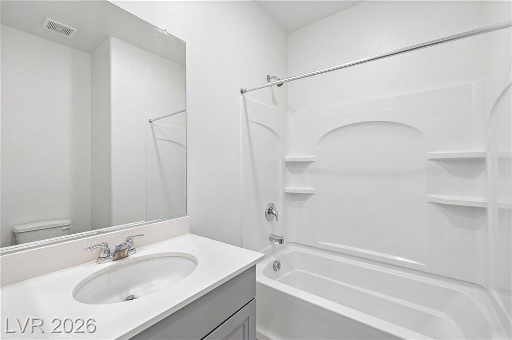 Downstairs full bath with a tub-shower combination at 3212 Segesta Avenue