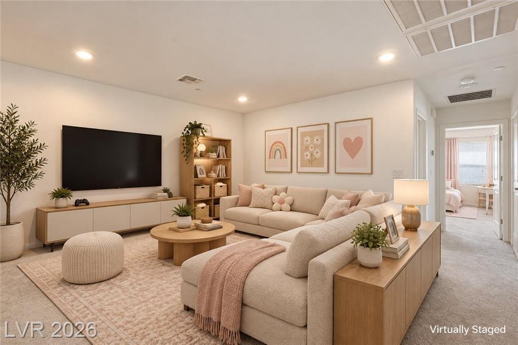 Open upstairs loft with recessed lighting, virtually staged