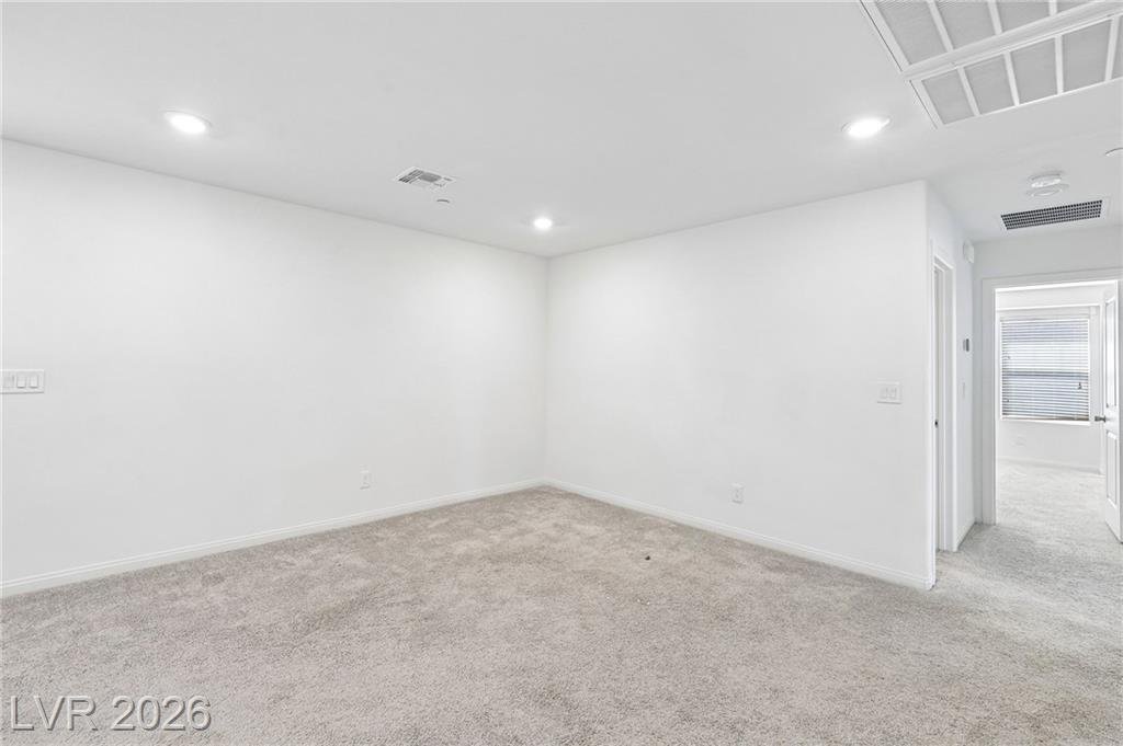 Carpeted upstairs loft beside the hall at 3212 Segesta Avenue