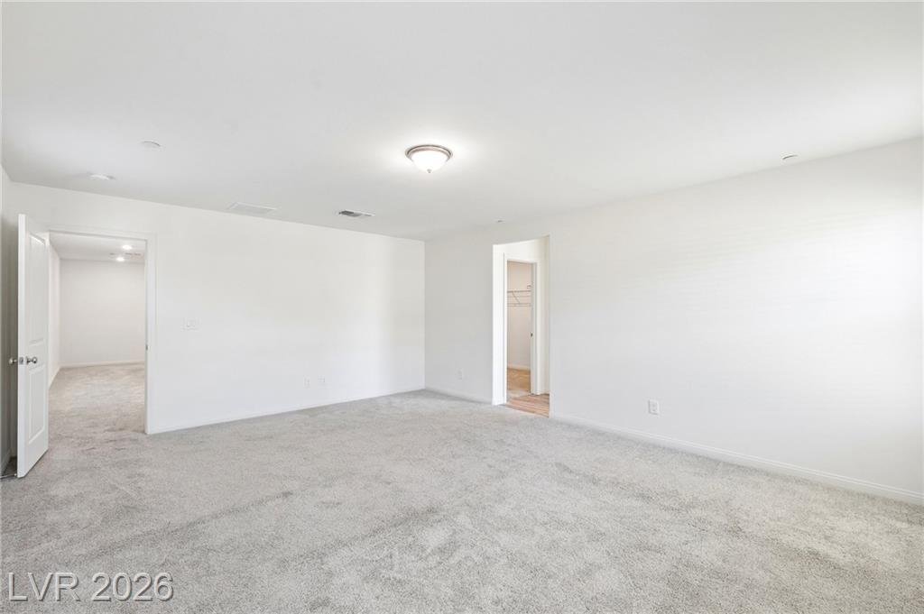 Primary bedroom toward the bath and walk-in closet
