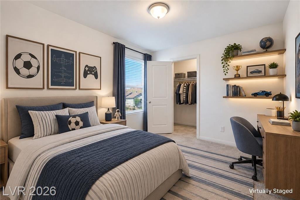 Secondary bedroom with a walk-in closet, virtually staged