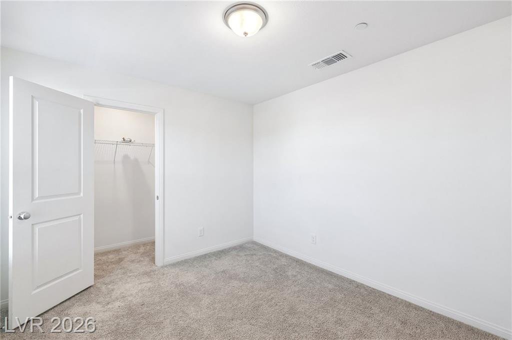 Secondary bedroom walk-in closet doorway