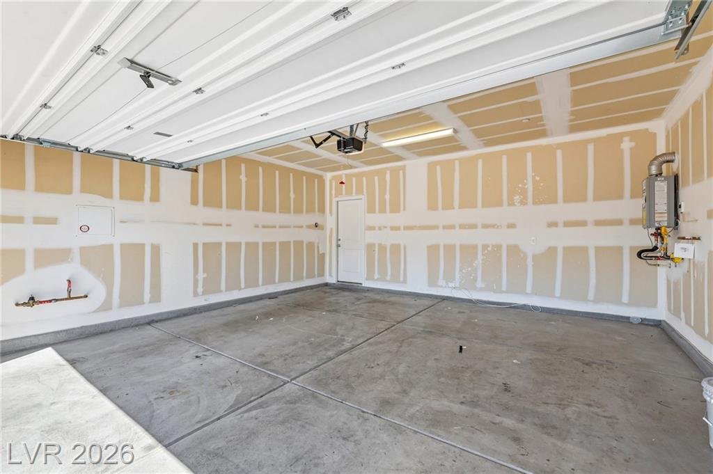 Two-car garage with a tankless water heater at 3212 Segesta Avenue