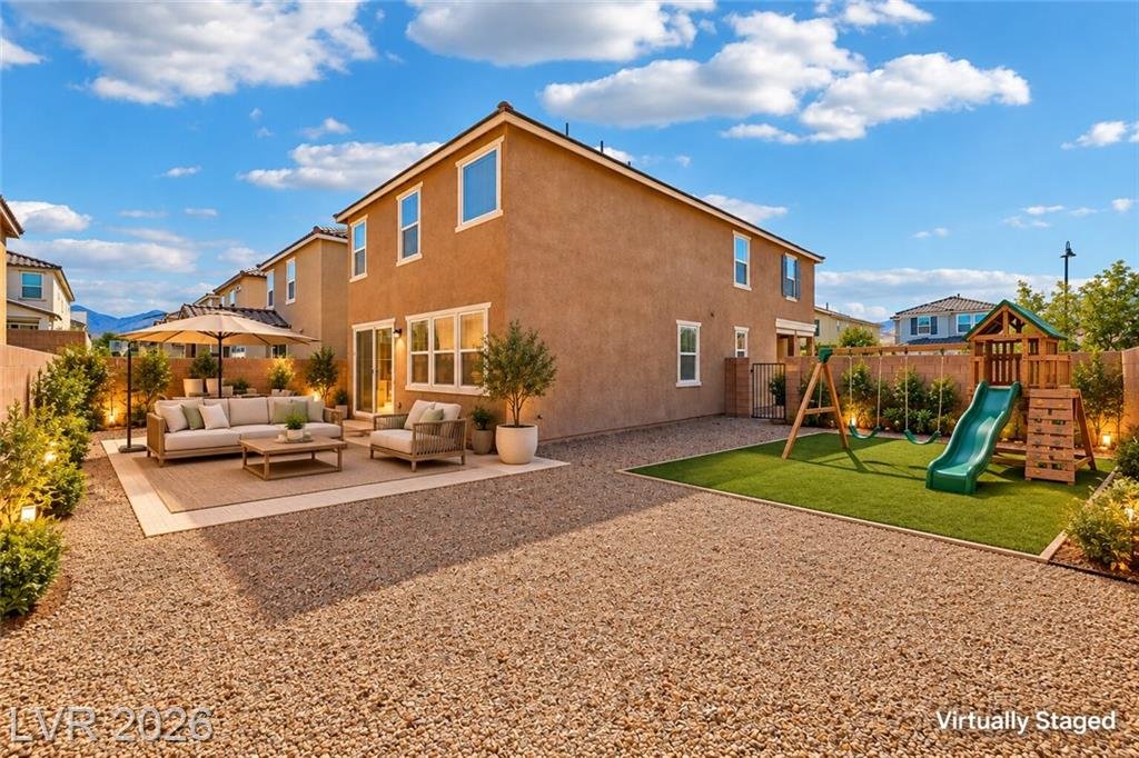 Corner-lot backyard with mountain views, virtually staged