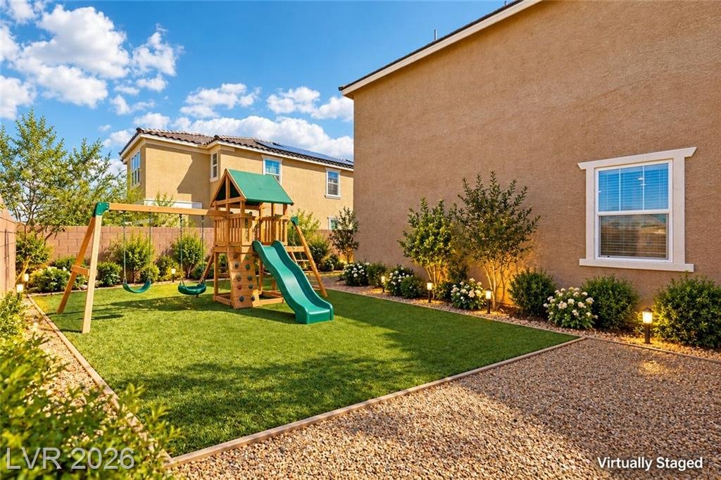 Side yard along the rear wall of the home, virtually staged