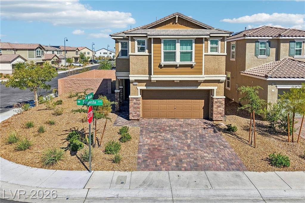 Aerial of the front elevation and corner lot at 3212 Segesta Avenue