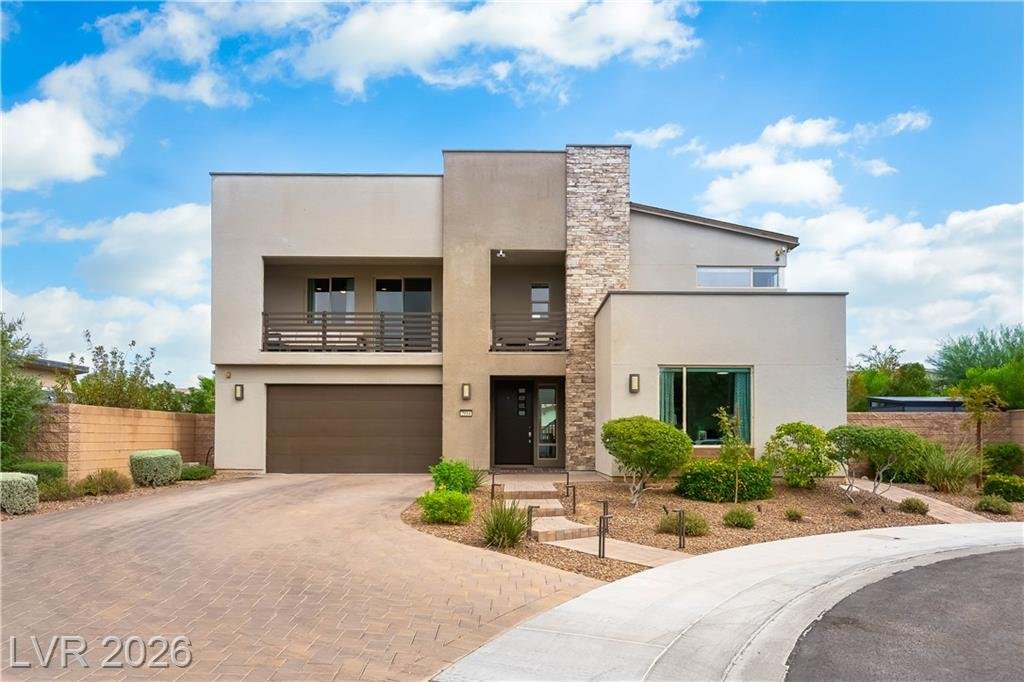 Modern two-story desert design home at 2114 Maderno Street, Inspirada, on a cul-de-sac with stone accents