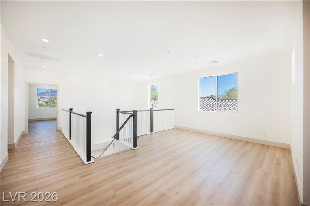 Upstairs loft beside the stair railing with mountain views at 2430 Quiet Ode Street
