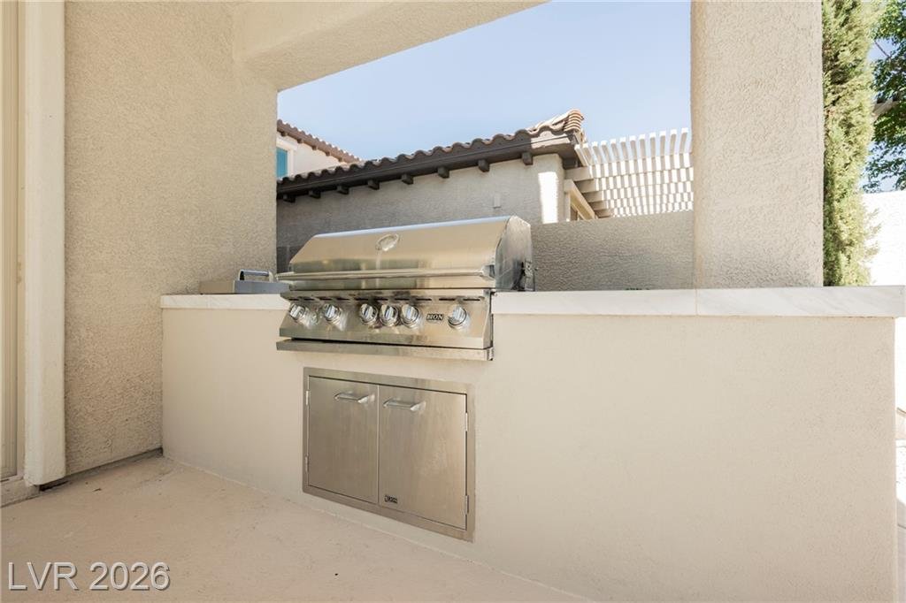Stainless built-in barbecue under the covered patio