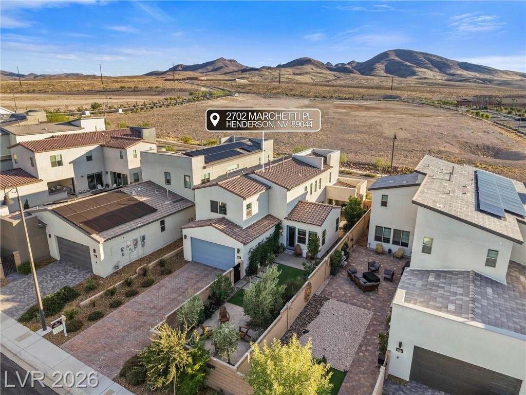 Aerial of 2702 Marchetti Place showing the long driveway, side patio and backyard
