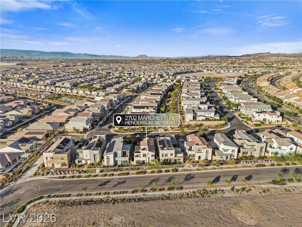 Wide aerial of Inspirada in Henderson NV with the home marked near the edge of the community