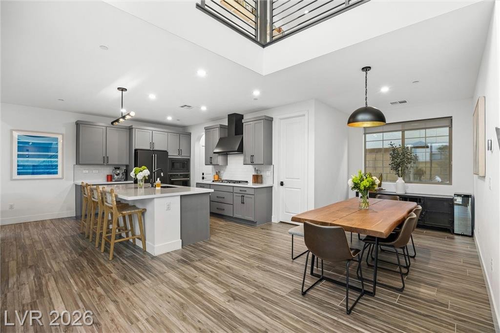 Dining room at 2702 Marchetti Place opening to the kitchen island