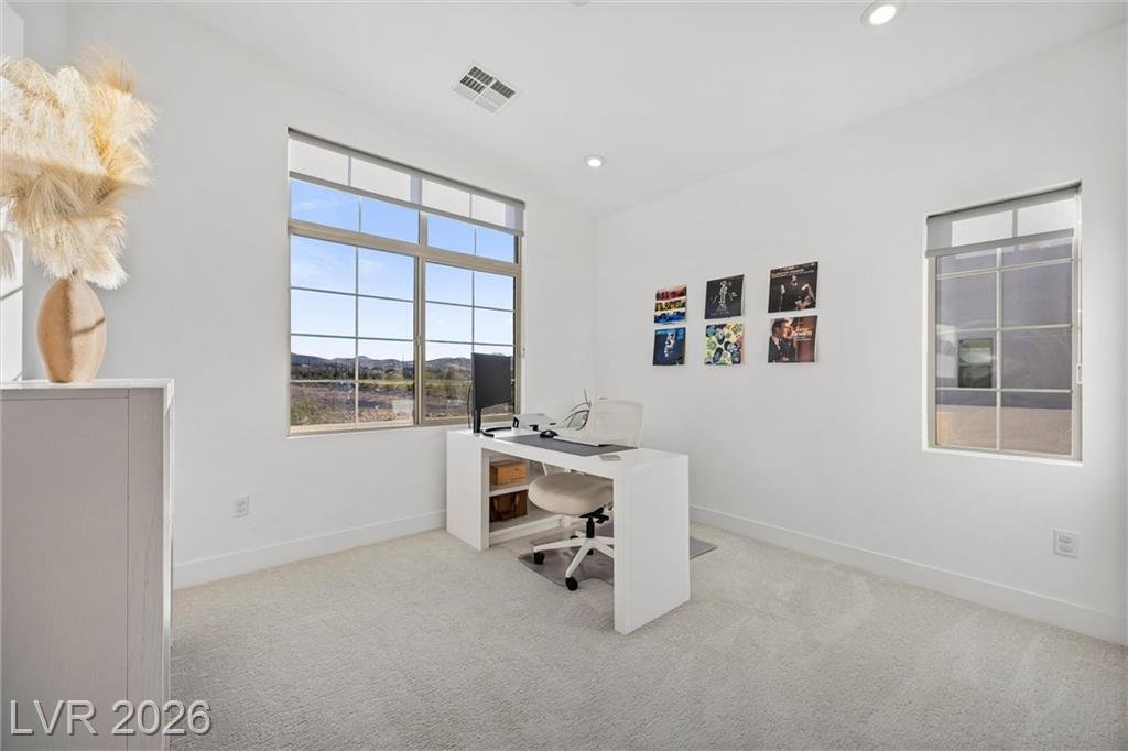 Secondary bedroom used as an office with mountain views