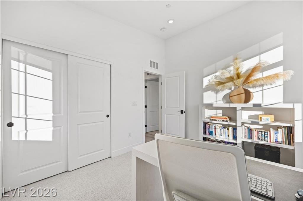 Bedroom office at 2702 Marchetti Place with sliding closet doors