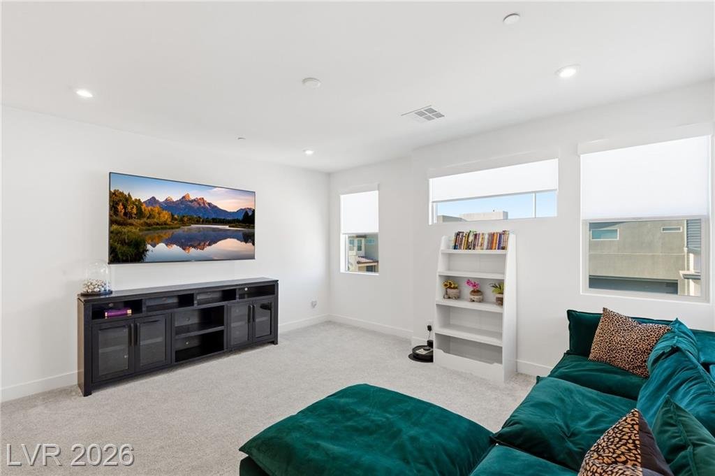 Large loft with a media wall and three windows