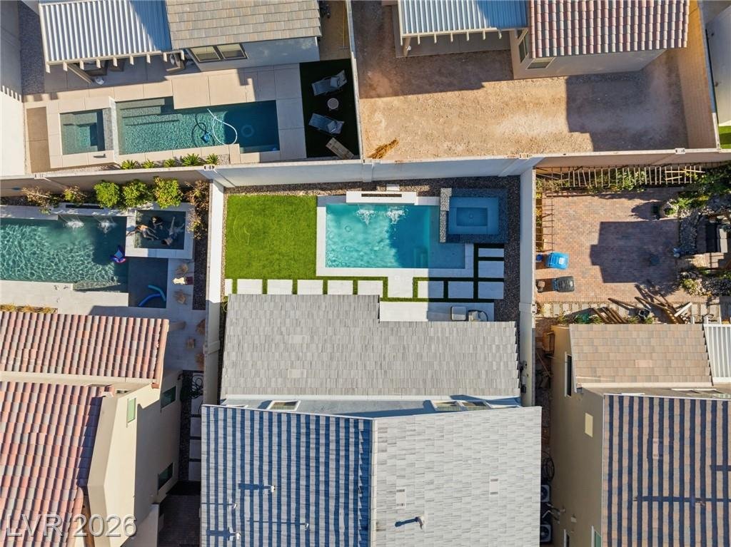 Close overhead aerial of the pool and spa at 3263 Fountaintree Avenue