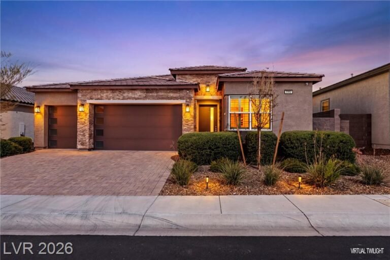 Twilight view of 3382 Spring Rock Avenue, a single-story Toll Brothers home in Inspirada