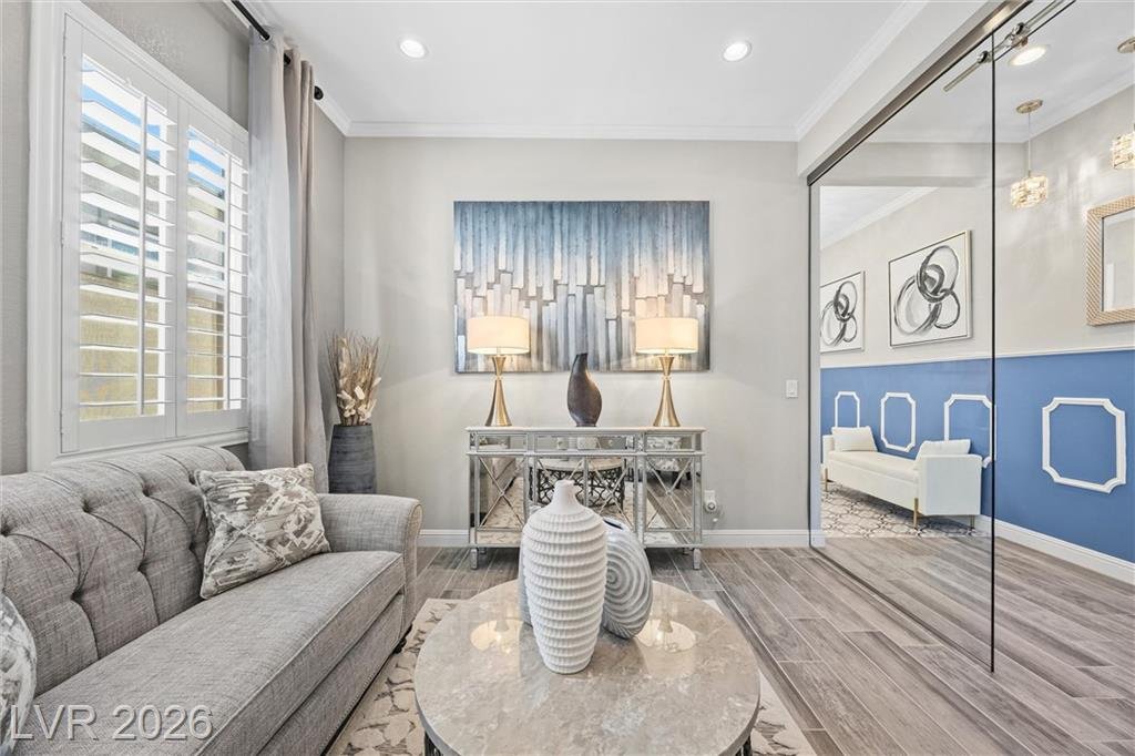 Glass-enclosed office at 3382 Spring Rock Avenue with plantation shutters