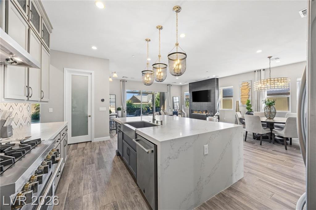 Kitchen island looking toward the fireplace and dining area