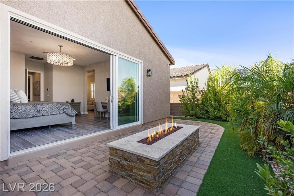 Gas fire pit outside the primary bedroom slider
