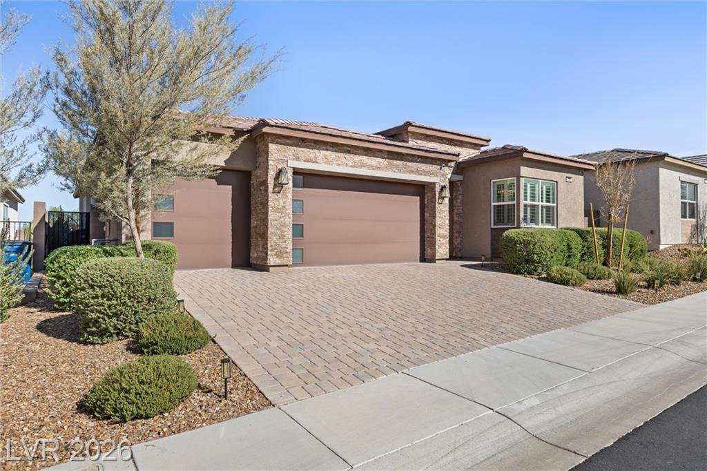 Stone-accent front elevation and desert landscaping