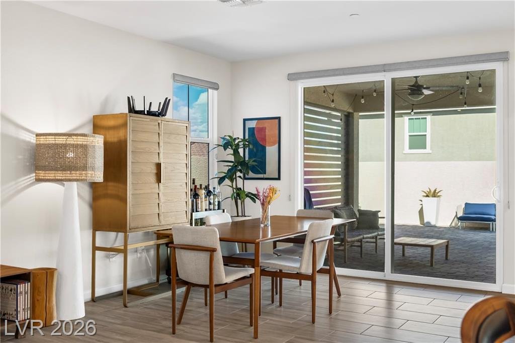Dining area with a sliding door to the covered patio
