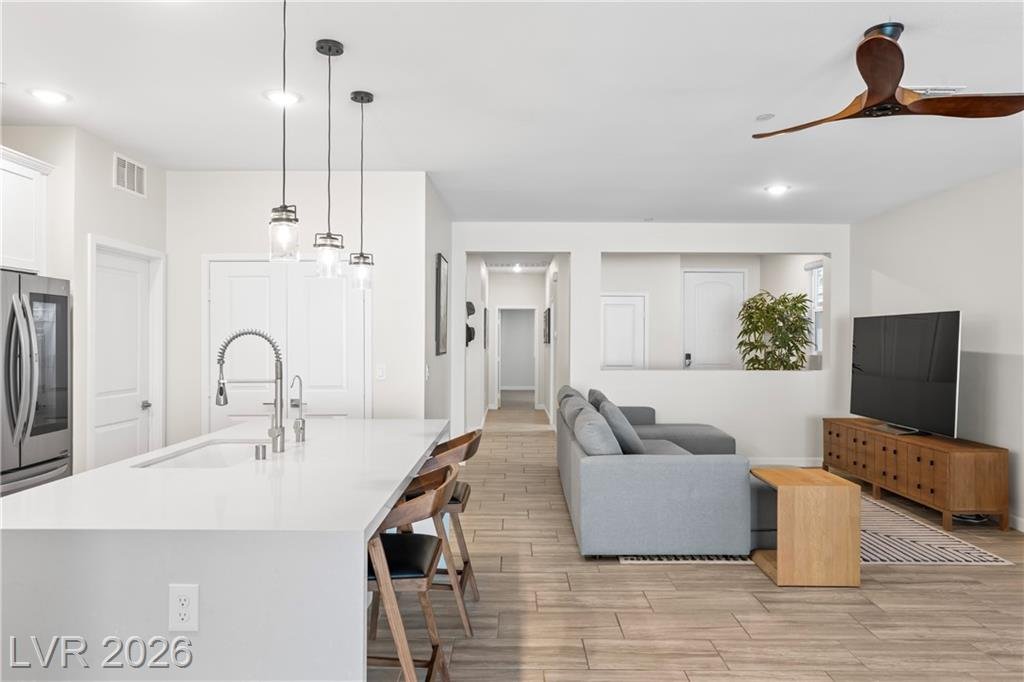 Kitchen island view down the hall at 3500 Brezine Avenue