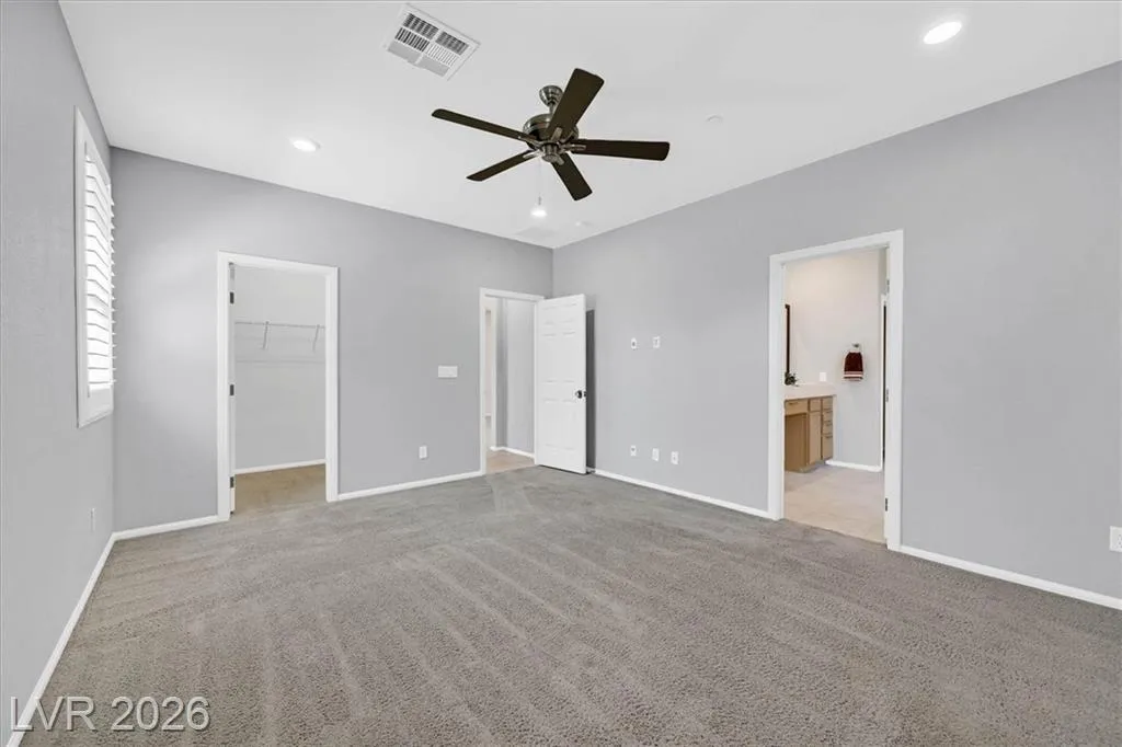Primary Bedroom - 3193 Brescia Bank Ave Inspirada 3193 Brescia Bank Ave Henderson NV - Primary Bedroom with Ensuite Bath Access | Inspirada Home for Sale