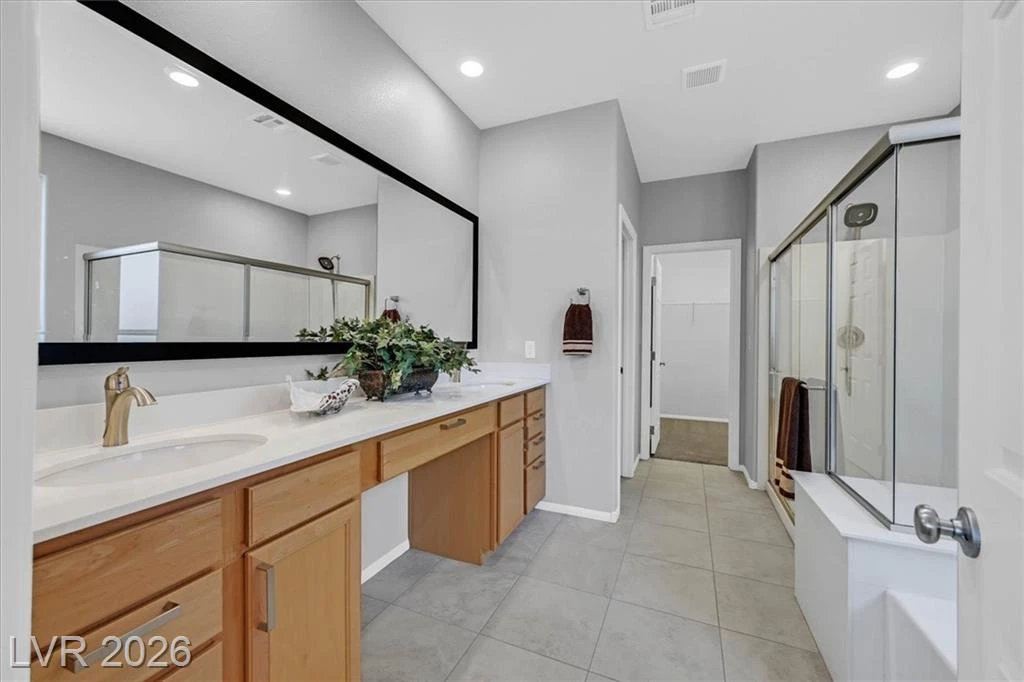 Primary Bathroom - 3193 Brescia Bank Ave Inspirada 3193 Brescia Bank Ave Henderson NV - Primary Bathroom with Double Vanity and Walk-In Shower | Inspirada Home for Sale