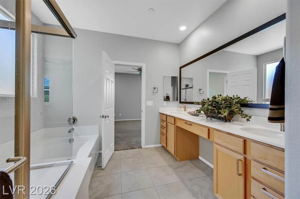 Primary Bathroom - 3193 Brescia Bank Ave Inspirada 3193 Brescia Bank Ave Henderson NV - Primary Bath with Dual Vanity & Walk-In Shower | Inspirada Home for Sale