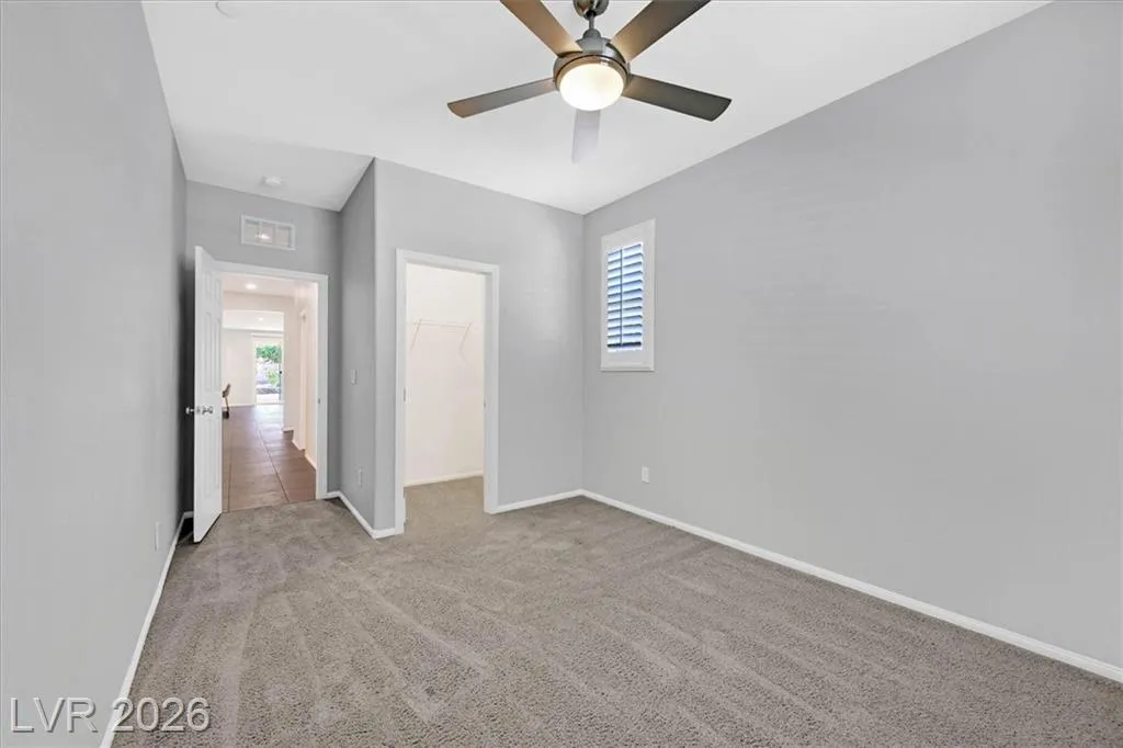 Primary Bedroom - 3193 Brescia Bank Ave Inspirada 3193 Brescia Bank Ave Henderson NV - Primary Bedroom with Ensuite Bath Access | Inspirada Home for Sale