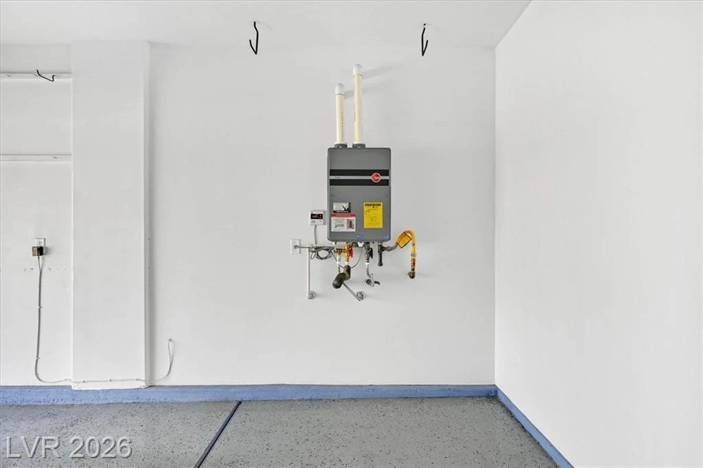 Utility Room with Tankless Water Heater - 3193 Brescia Bank Ave Inspirada 3193 Brescia Bank Ave Henderson NV - Tankless Water Heater in Utility Room | Inspirada Home for Sale