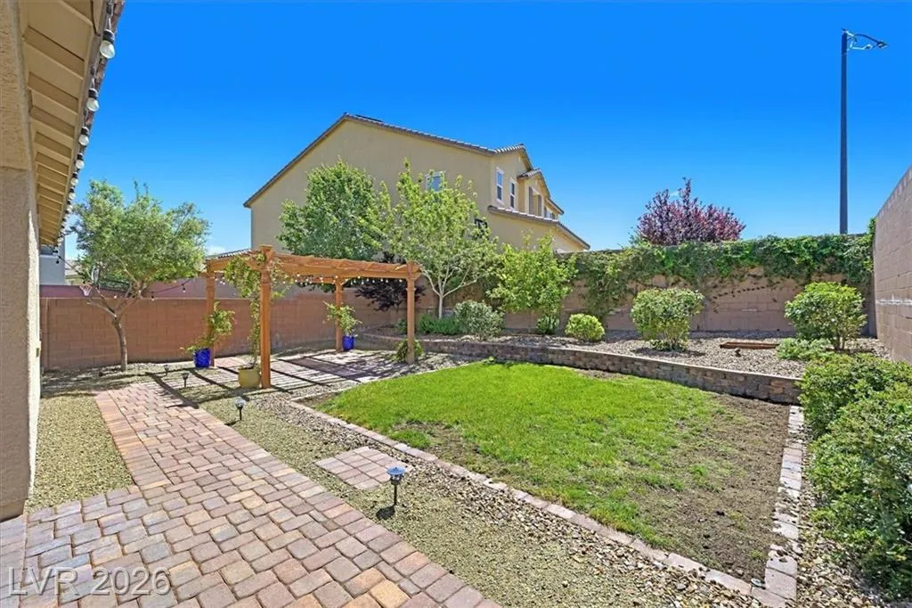 Backyard Oasis - 3193 Brescia Bank Ave Inspirada 3193 Brescia Bank Ave Henderson NV - Backyard with Patio, Pergola & Manicured Landscaping | Inspirada Home for Sale